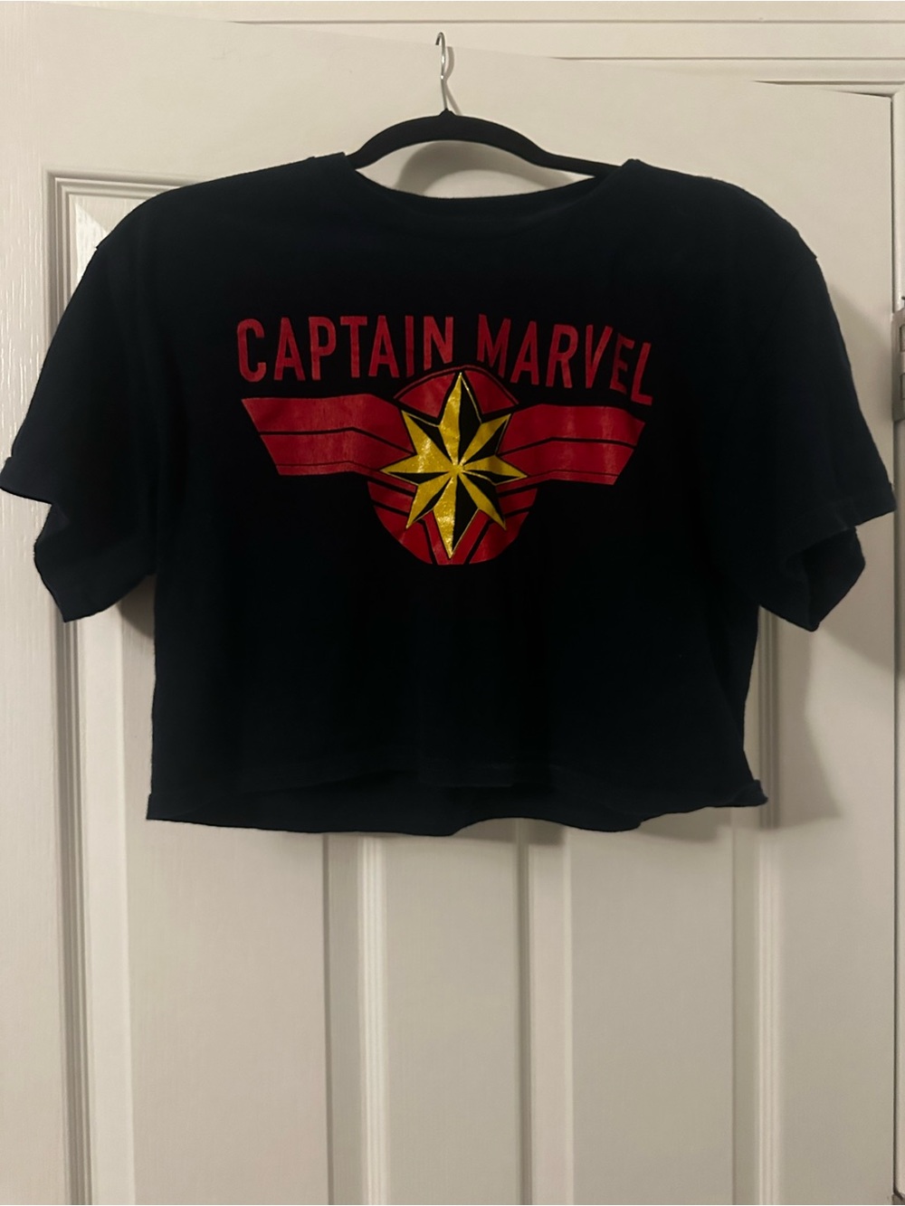 Captain Marvel Women’s Navy Blue Crop Tee with Red & Gold Logo
